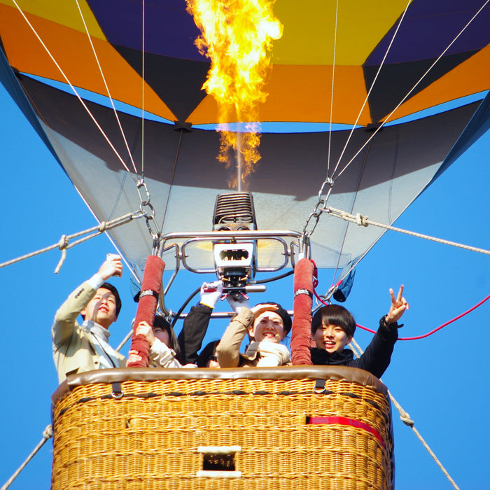 Hot air ballooning moring flight in summer / Furano