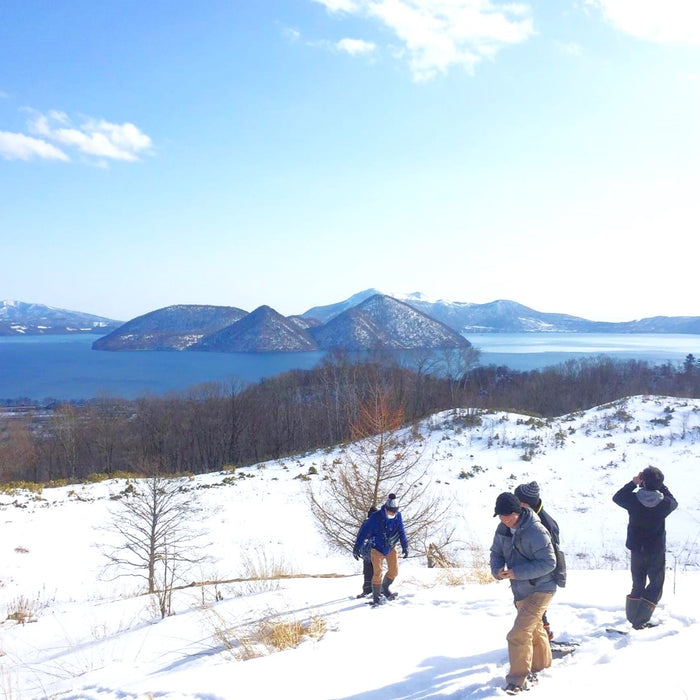 Snowshoe trekking  on the shores of Lake Toya / Toya