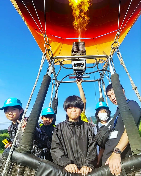 Hot air ballooning moring flight in summer / Furano