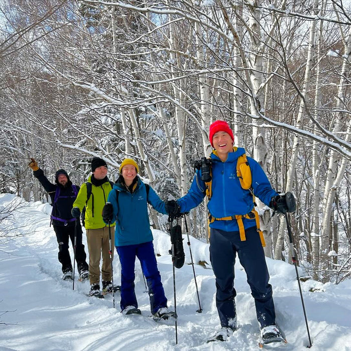 Snowshoe trekking in morning snow forest / Sapporo