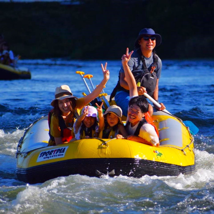 Private eco rafting on blue water river by chartered boat / Biei