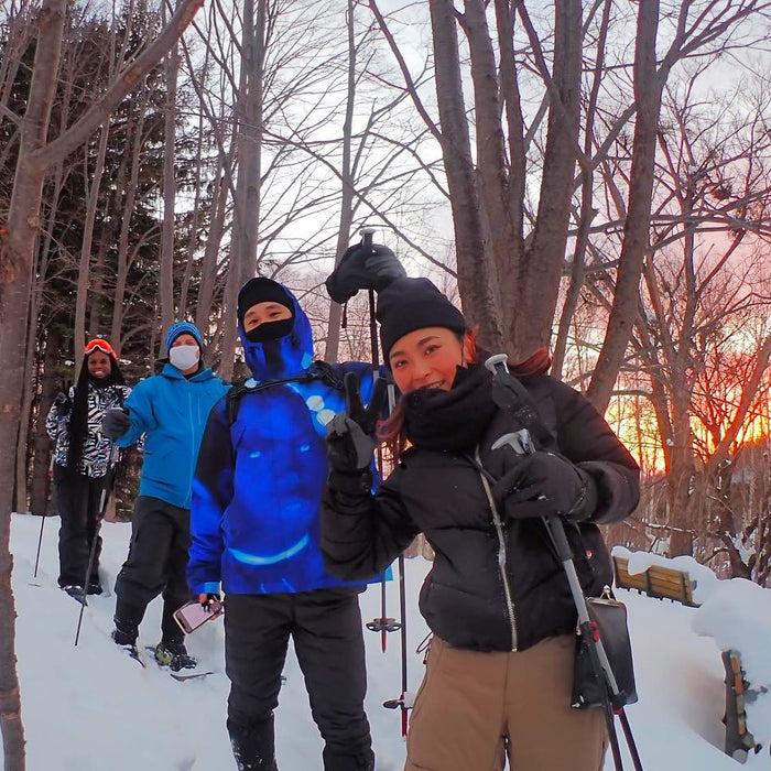 Snowshoe trekking in morning snow forest / Sapporo